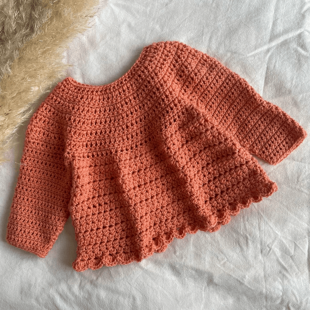 Coral crochet matinee jacket