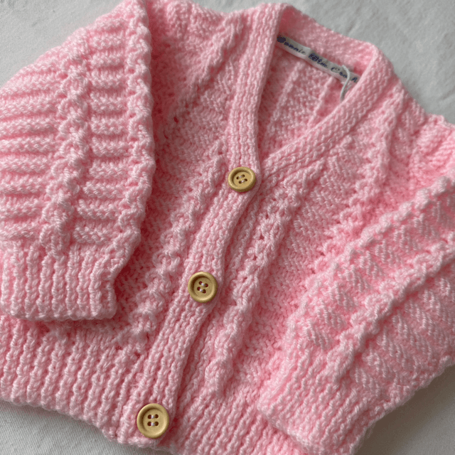 Pink cable knit cardigan