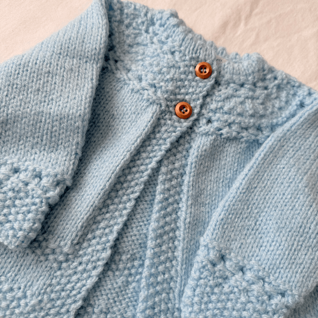 Blue knitted baby matinee jacket