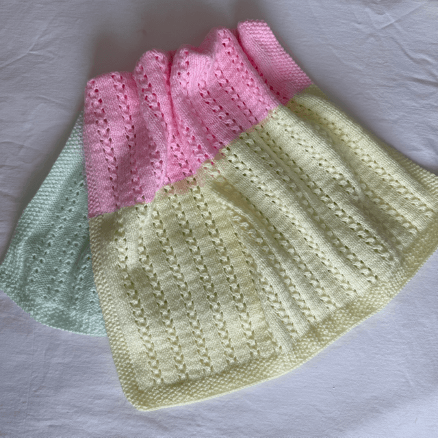 Pastel rainbow pointelle knitted buggy blanket