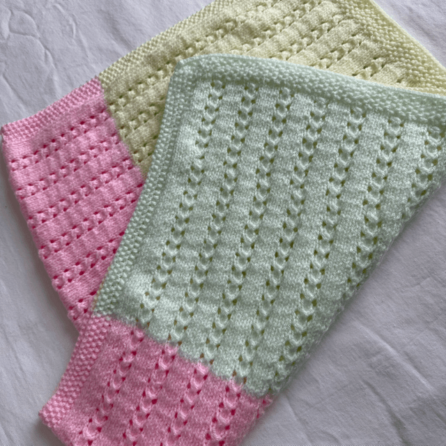 Pastel rainbow pointelle knitted buggy blanket