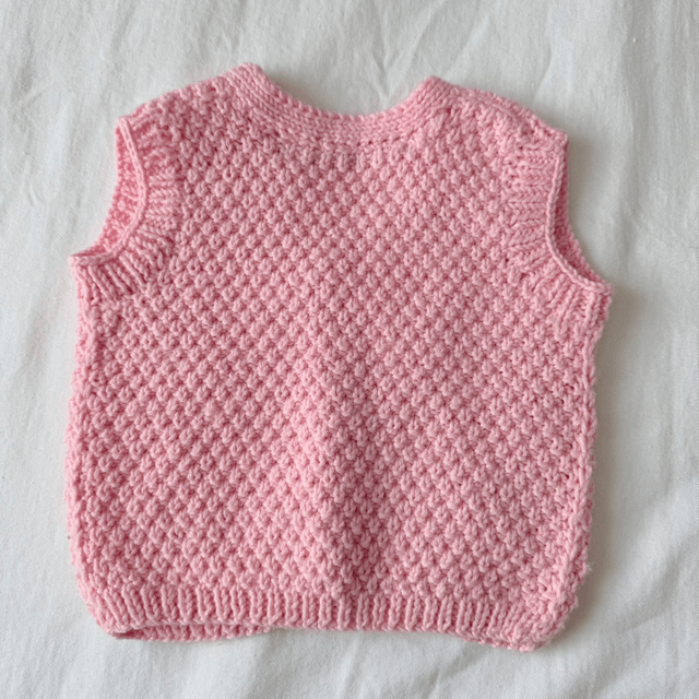 Pink knitted waistcoat