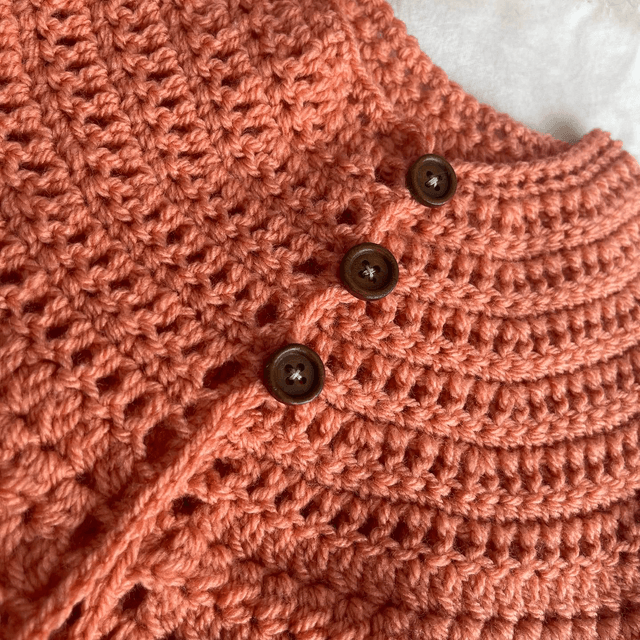 Coral crochet matinee jacket