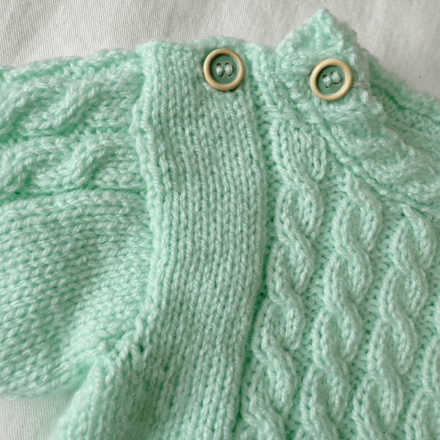 Green cable knit jumper