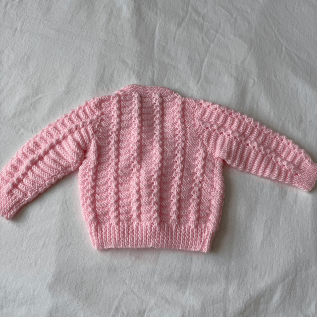 Pink cable knit cardigan
