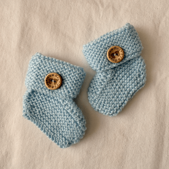 Blue gender announcement booties