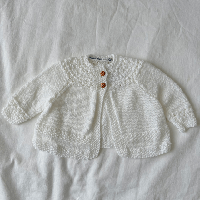 White knitted baby matinee jacket