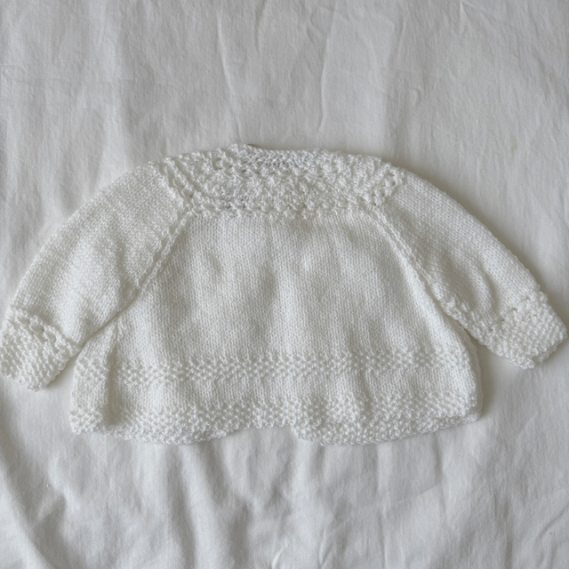 White knitted baby matinee jacket