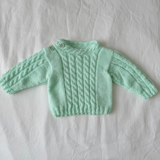 Green cable knit jumper
