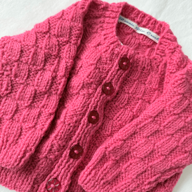 Fuschia knitted basket weave cardigan