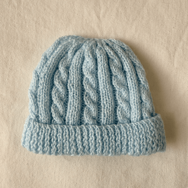 Blue cable knit hat