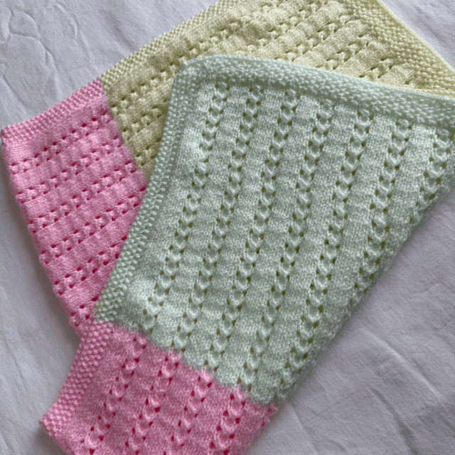 Pastel rainbow pointelle knitted buggy blanket