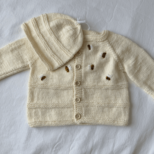 Cream knitted cardigan with bumblebee embroidery and matching hat