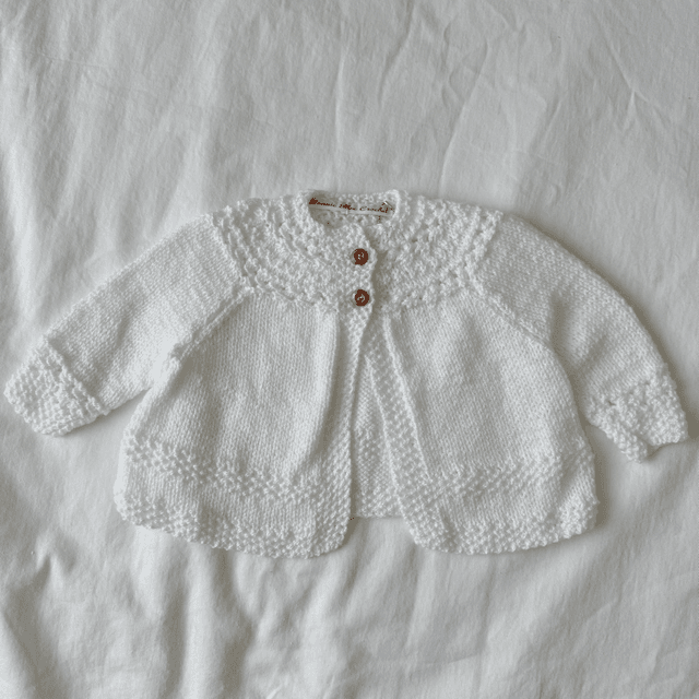 White knitted baby matinee jacket