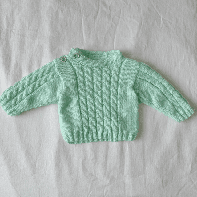 Green cable knit jumper
